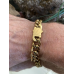 Stalen goudkleurige armband met grove schakels. L 24 cm